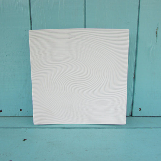 circa. 1960s contemporary white ceramic optical swirl/textured wave square plate