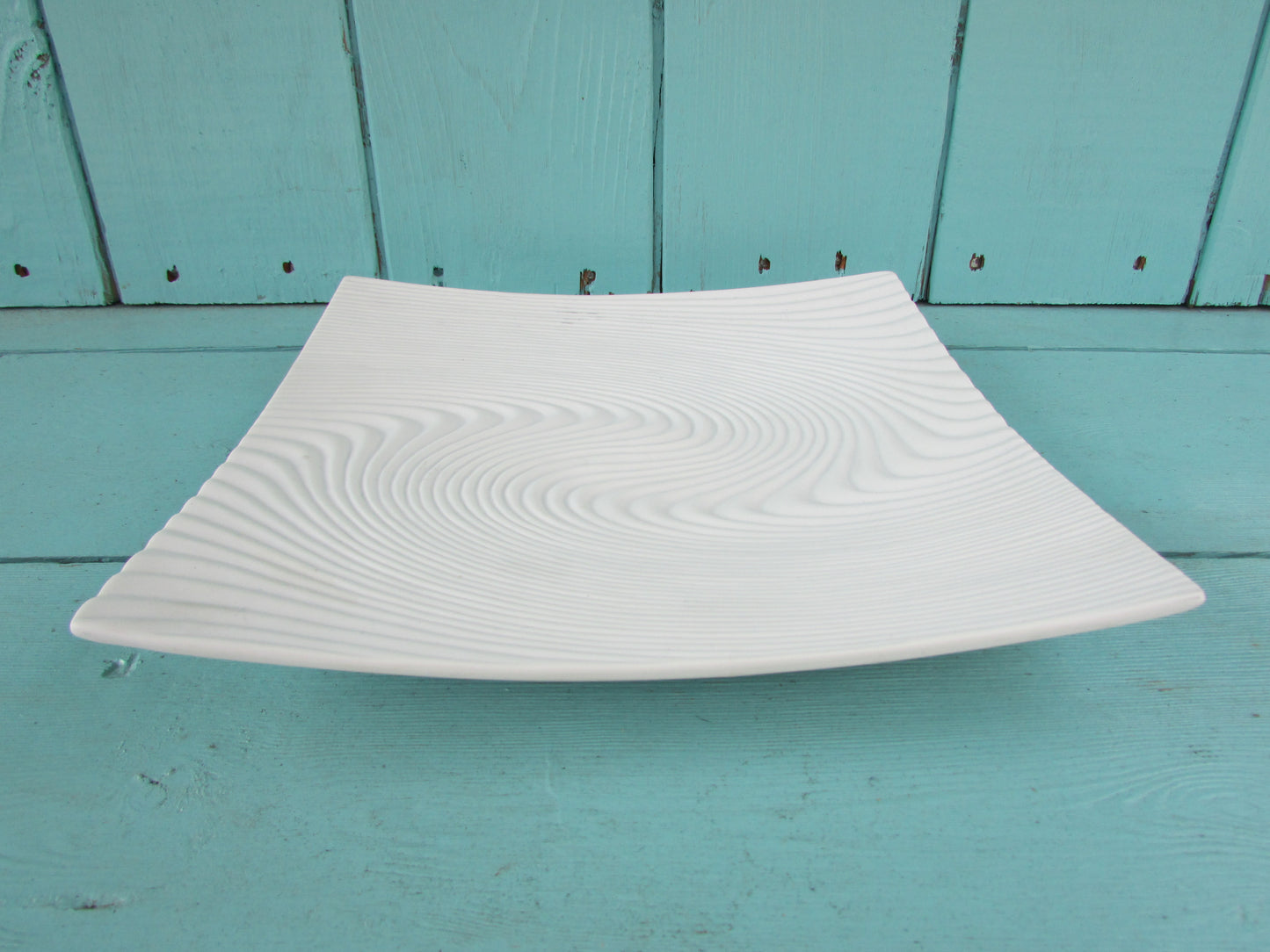 circa. 1960s contemporary white ceramic optical swirl/textured wave square plate