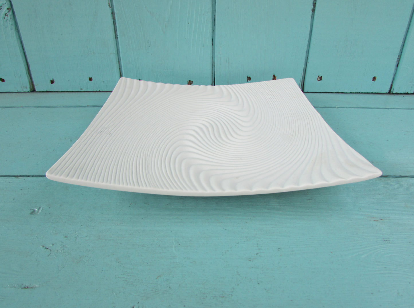 circa. 1960s contemporary white ceramic optical swirl/textured wave square plate