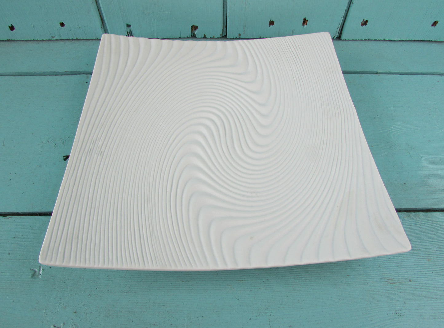 circa. 1960s contemporary white ceramic optical swirl/textured wave square plate