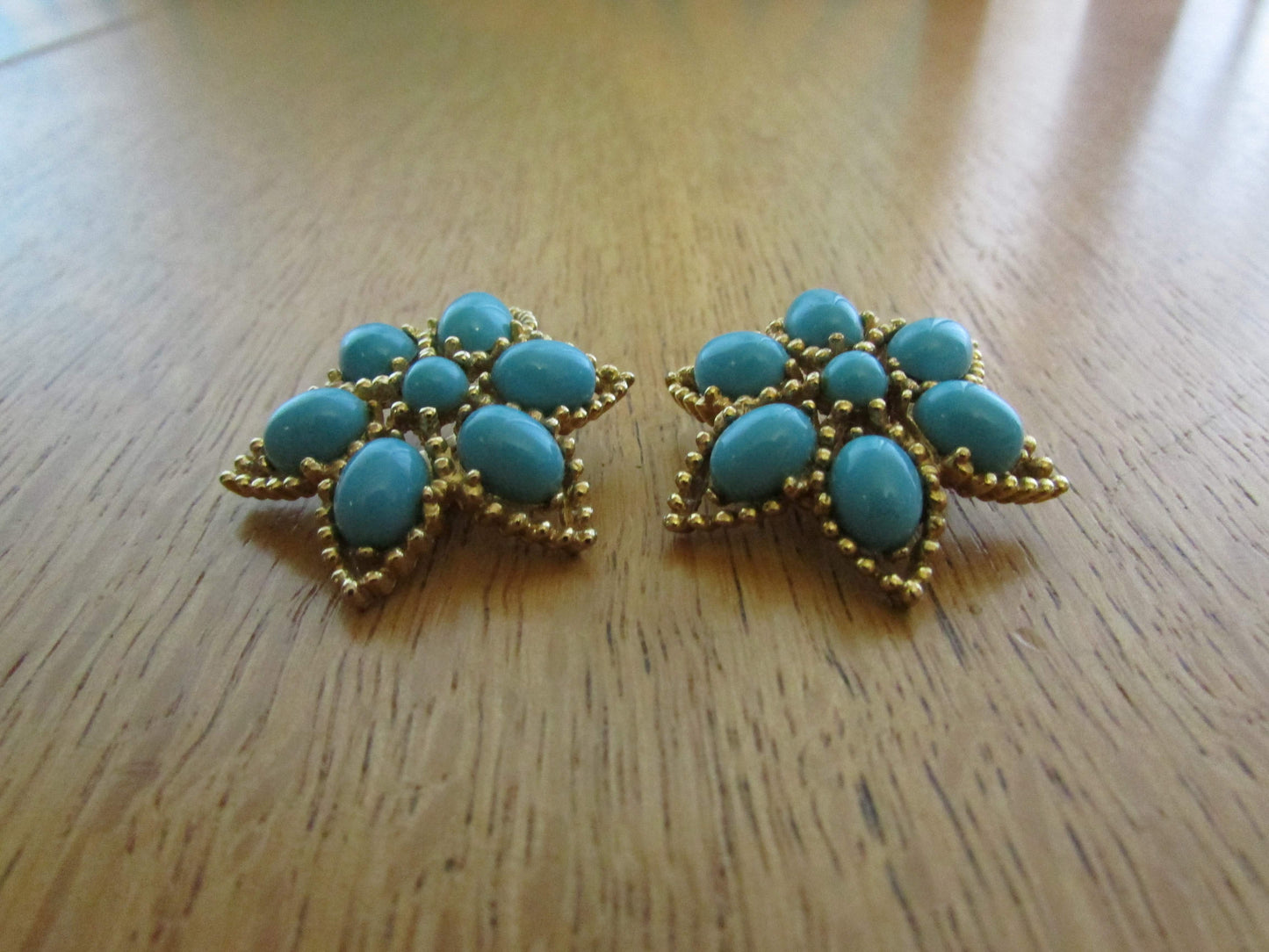 Large vintage gold-tone & turquoise plastic cabochon flower clip-on earrings