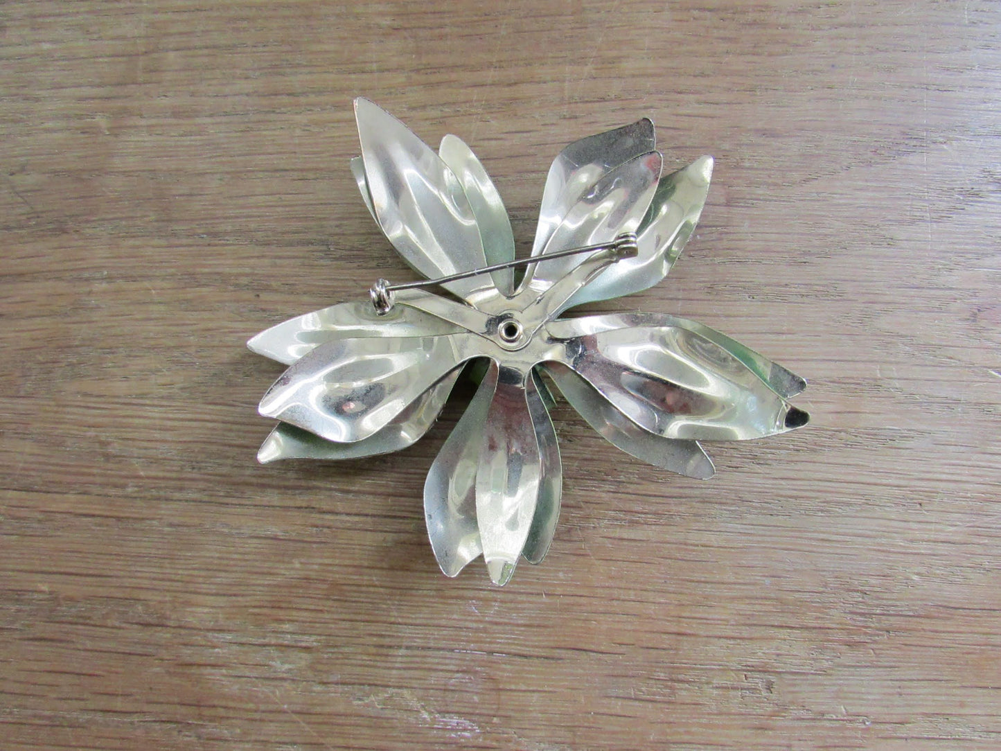 1960s large green metal flower brooch