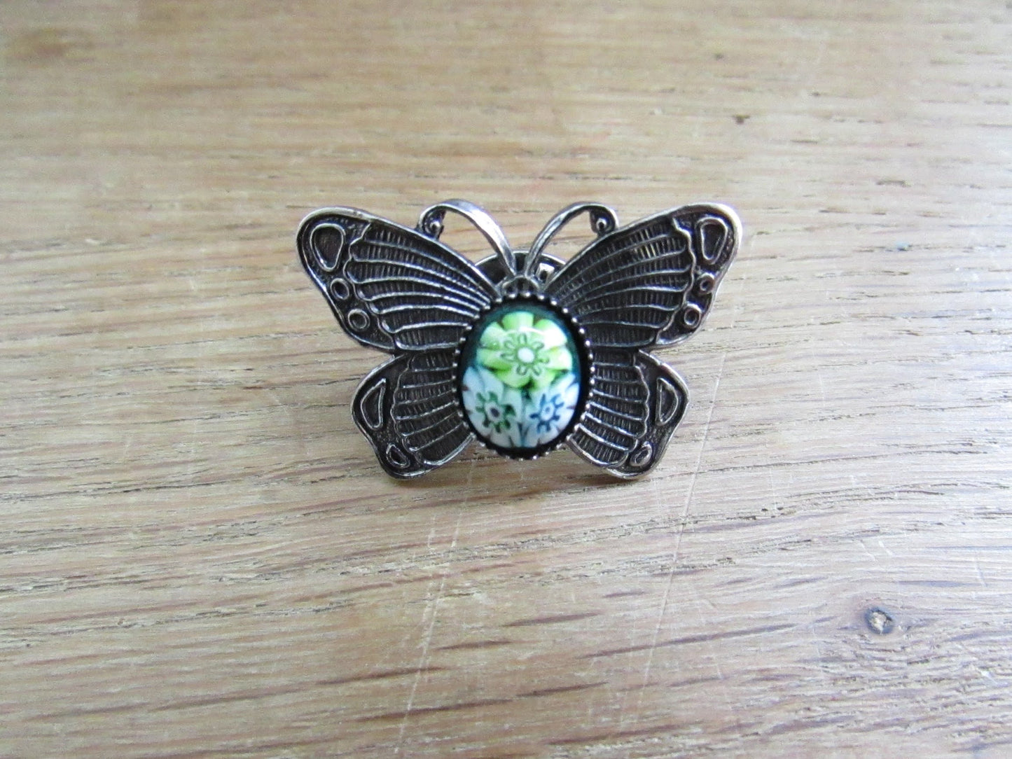 Vintage silver-tone butterfly brooch with Millefiori cabochon detail