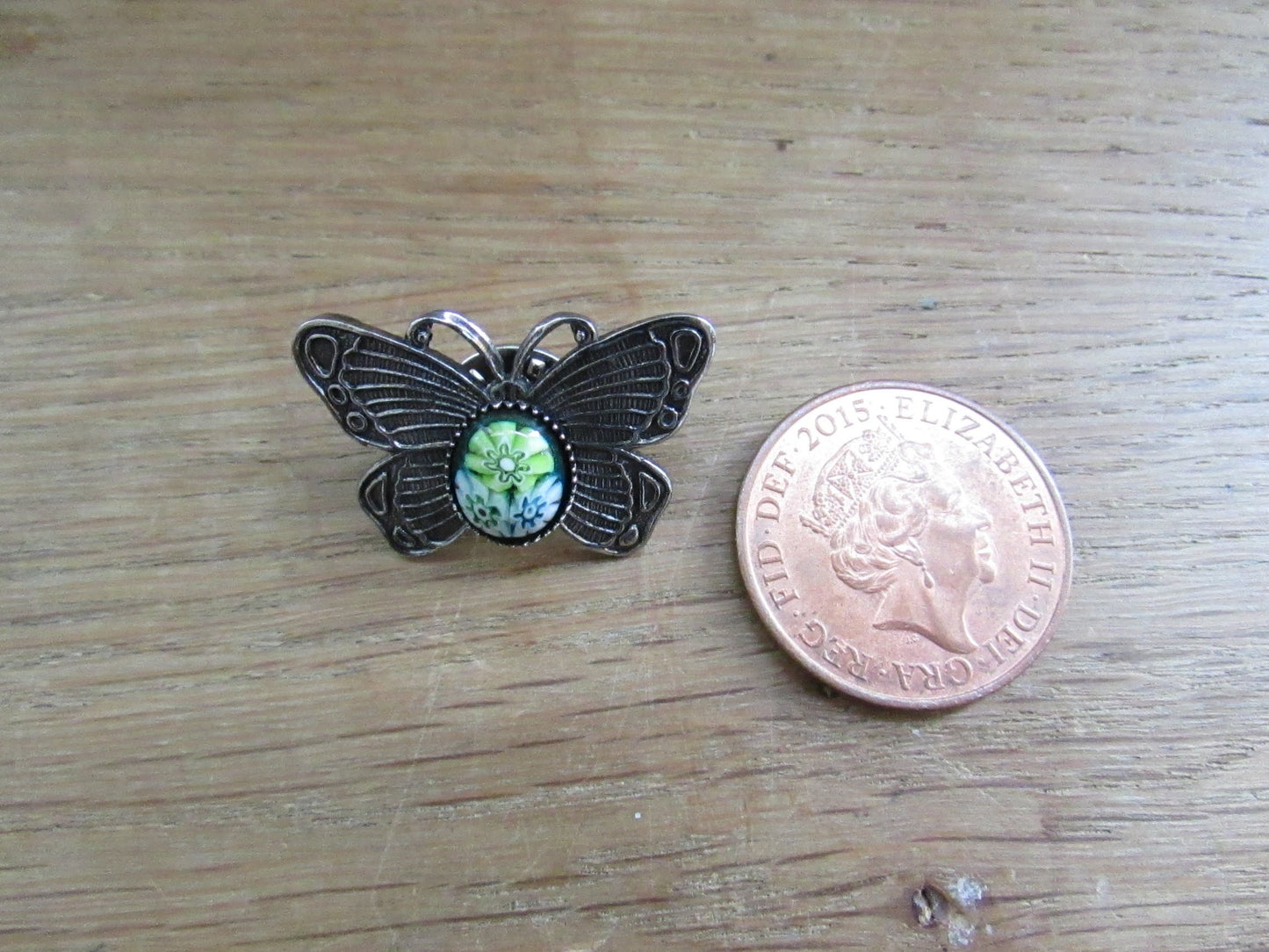 Vintage silver-tone butterfly brooch with Millefiori cabochon detail