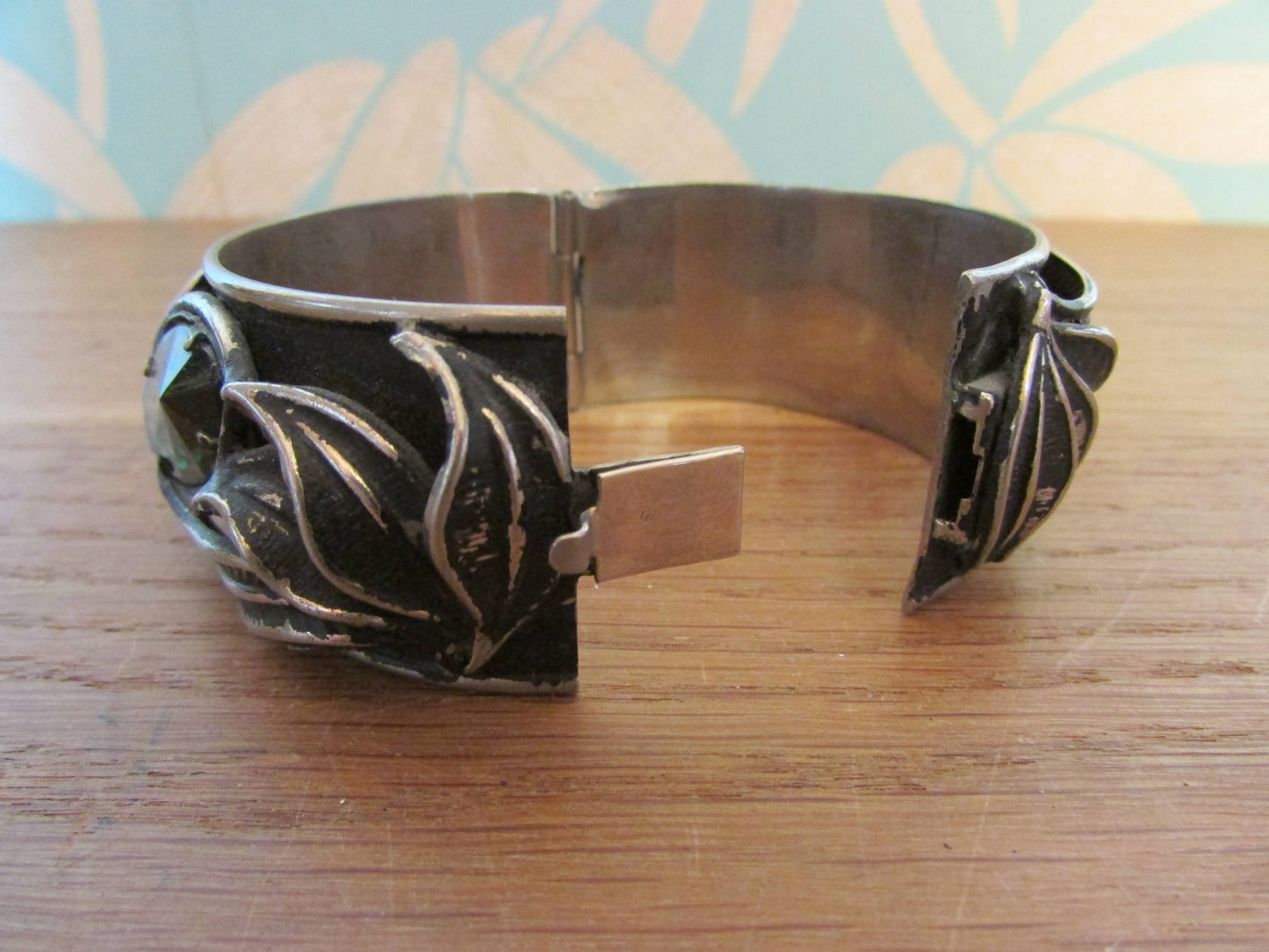 1960s/70s Art Nouveau-style clamper bracelet with green glass stones