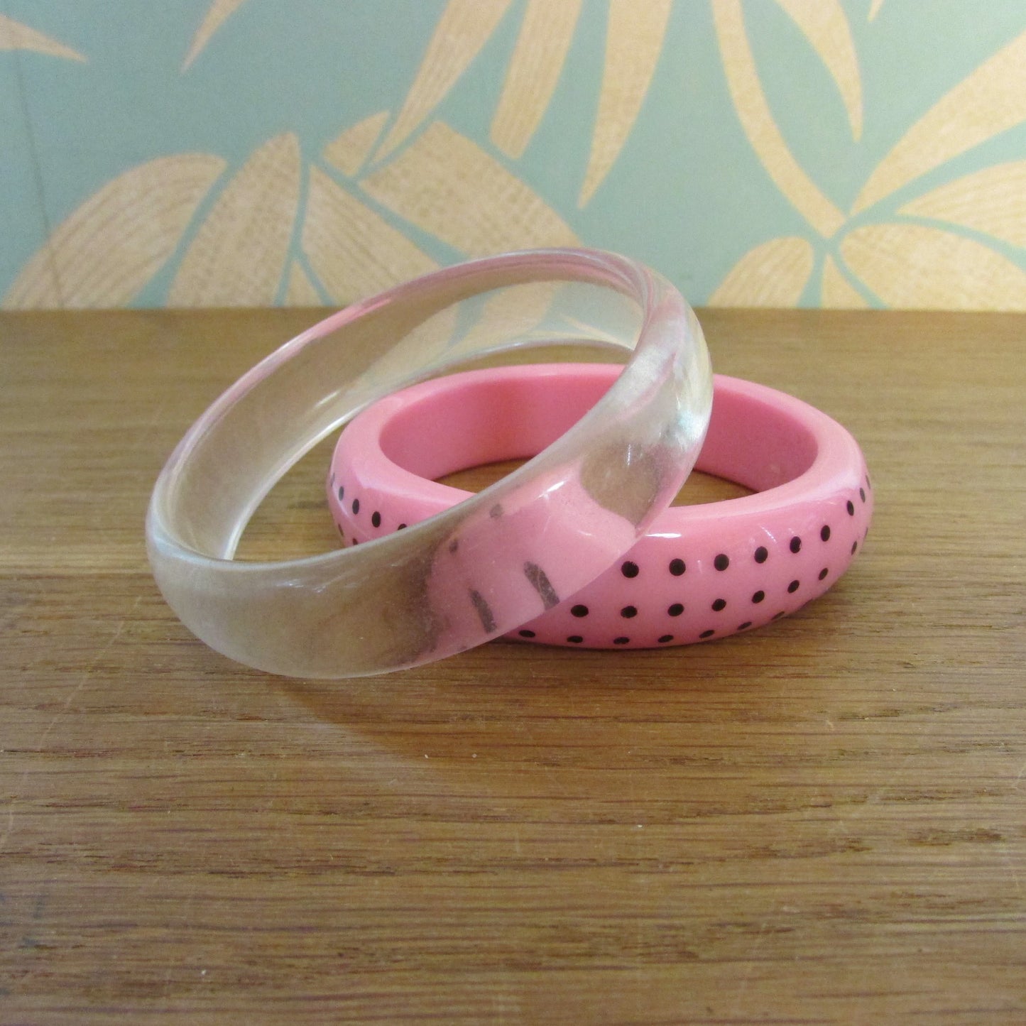 circa. 1980s clear translucent, and pink polka dot acrylic bangle set