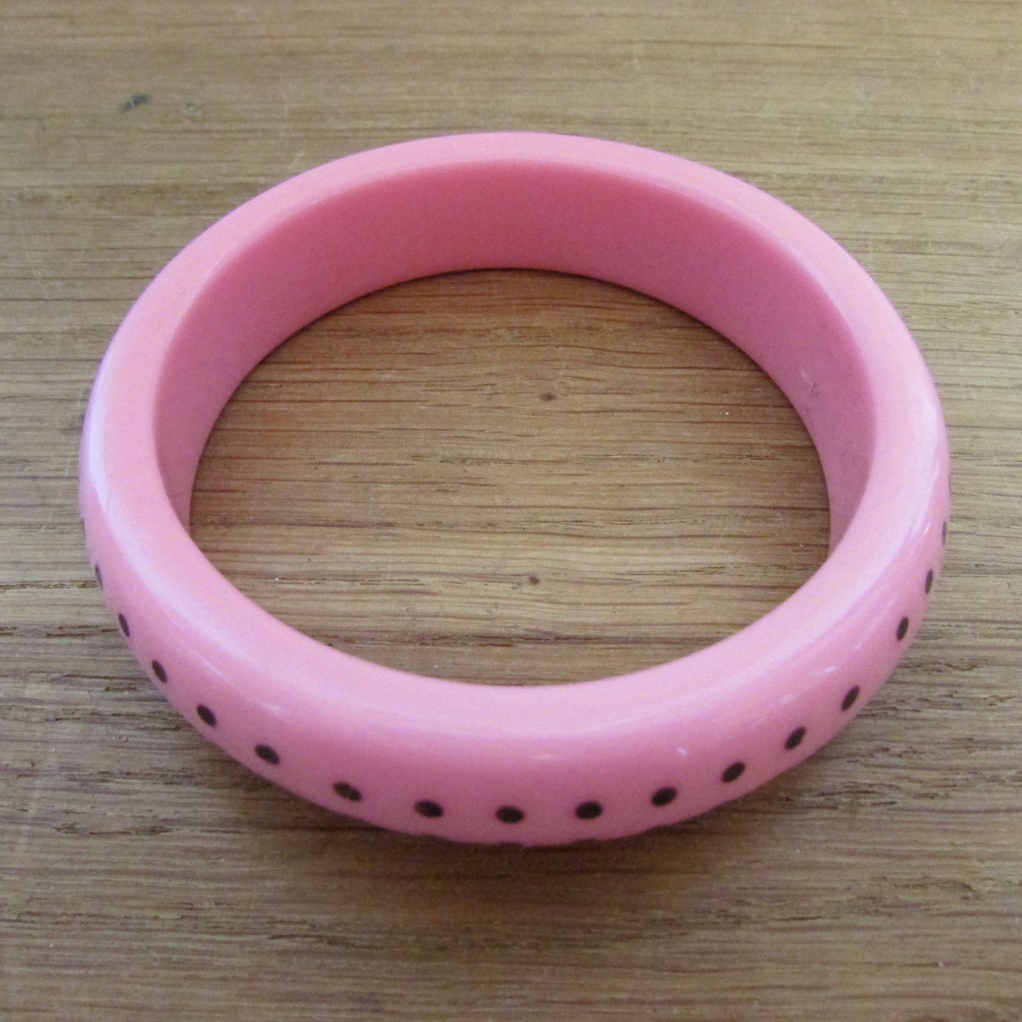 circa. 1980s clear translucent, and pink polka dot acrylic bangle set