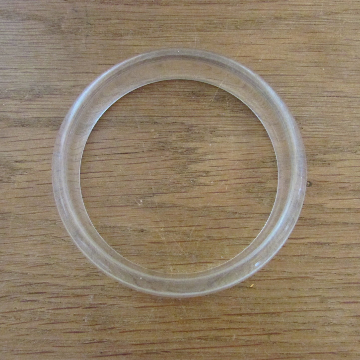 circa. 1980s clear translucent, and pink polka dot acrylic bangle set