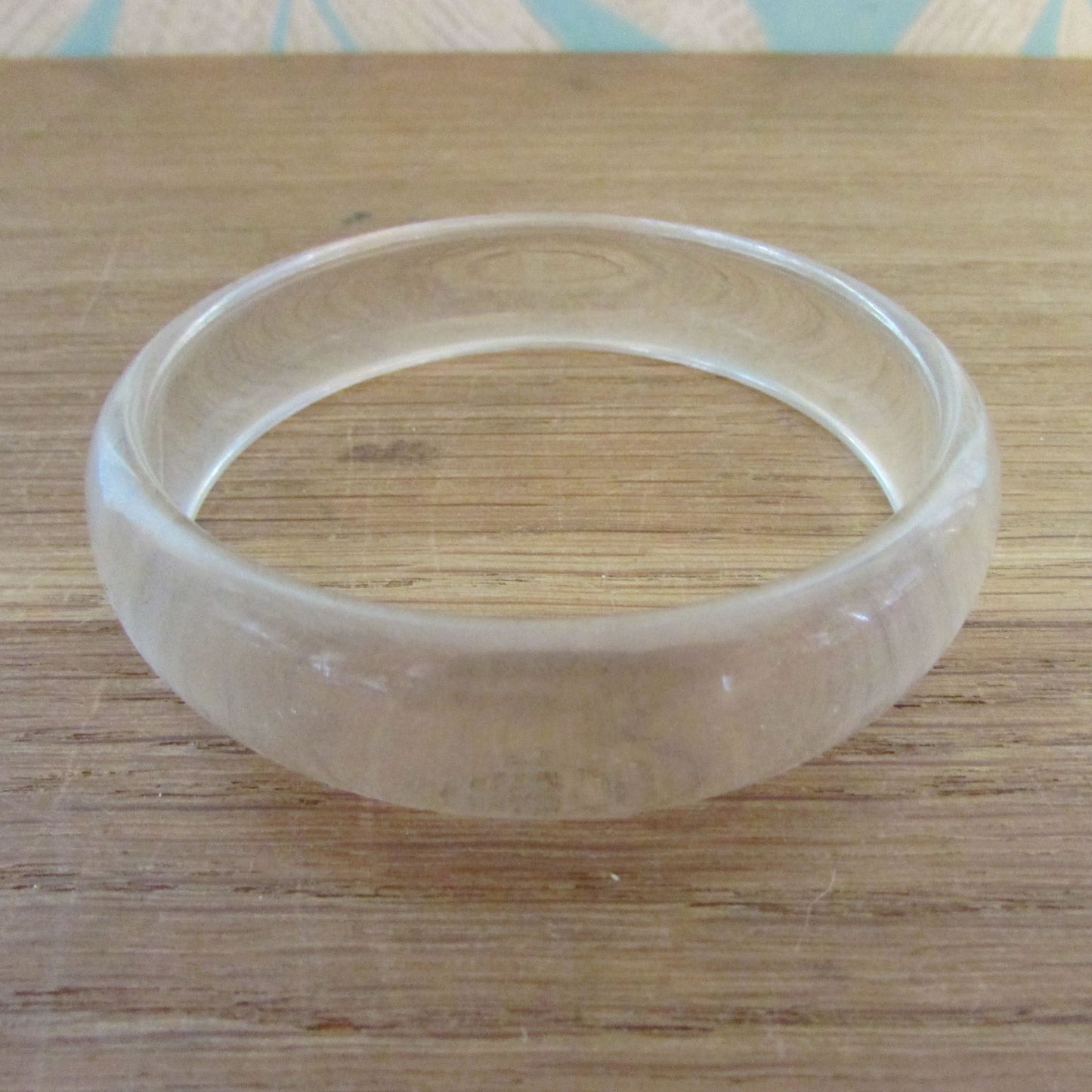 circa. 1980s clear translucent, and pink polka dot acrylic bangle set