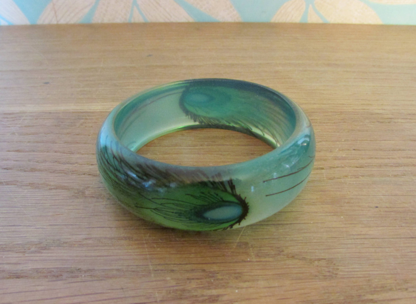 Vintage resin peacock feather bangle