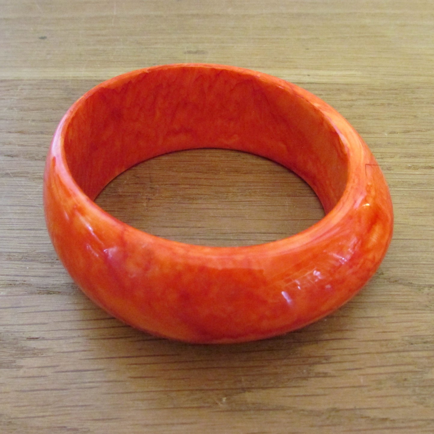 1970s marbled orange chunky asymmetric acrylic bangle