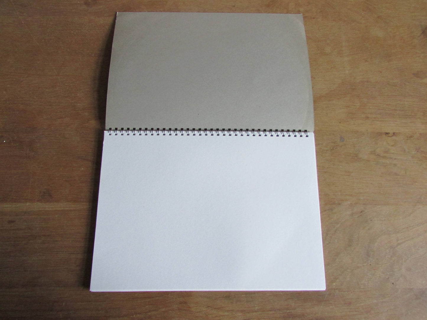 Home-made A4 wire-bound sketchbook using 100% recycled 140gsm Cartridge Paper, The Hits of The 60s