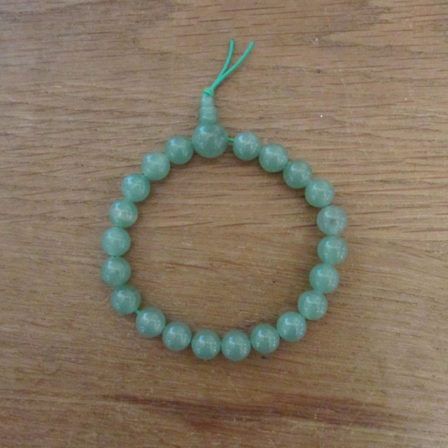 Vintage-style translucent green glass bead bracelet
