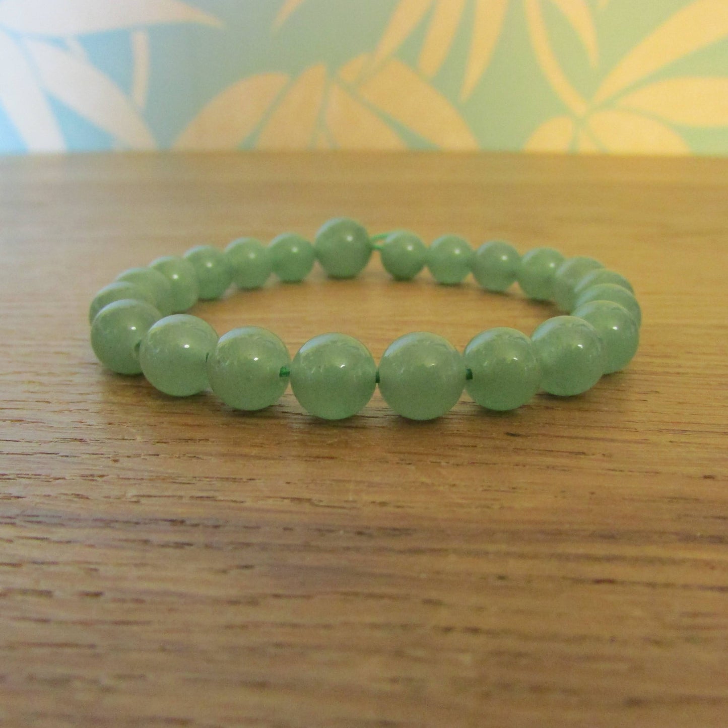 Vintage-style translucent green glass bead bracelet