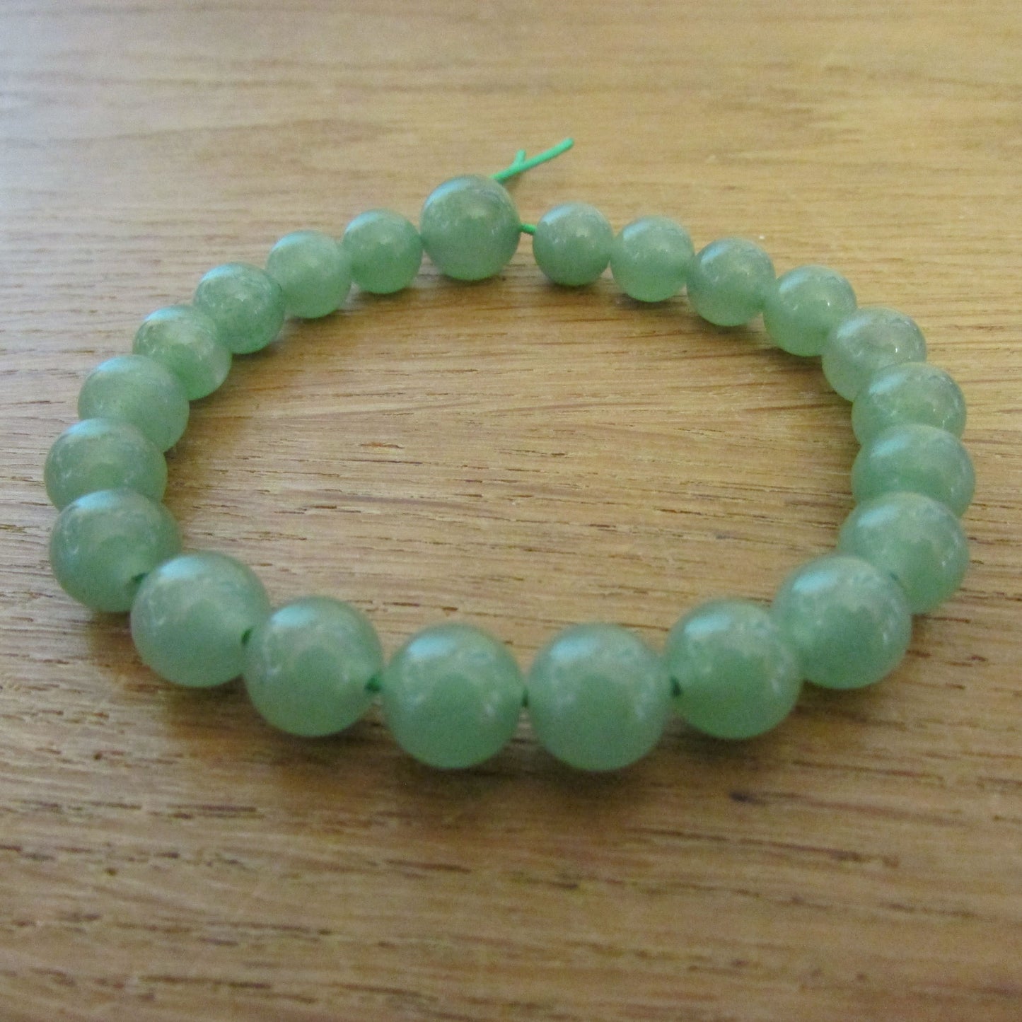 Vintage-style translucent green glass bead bracelet