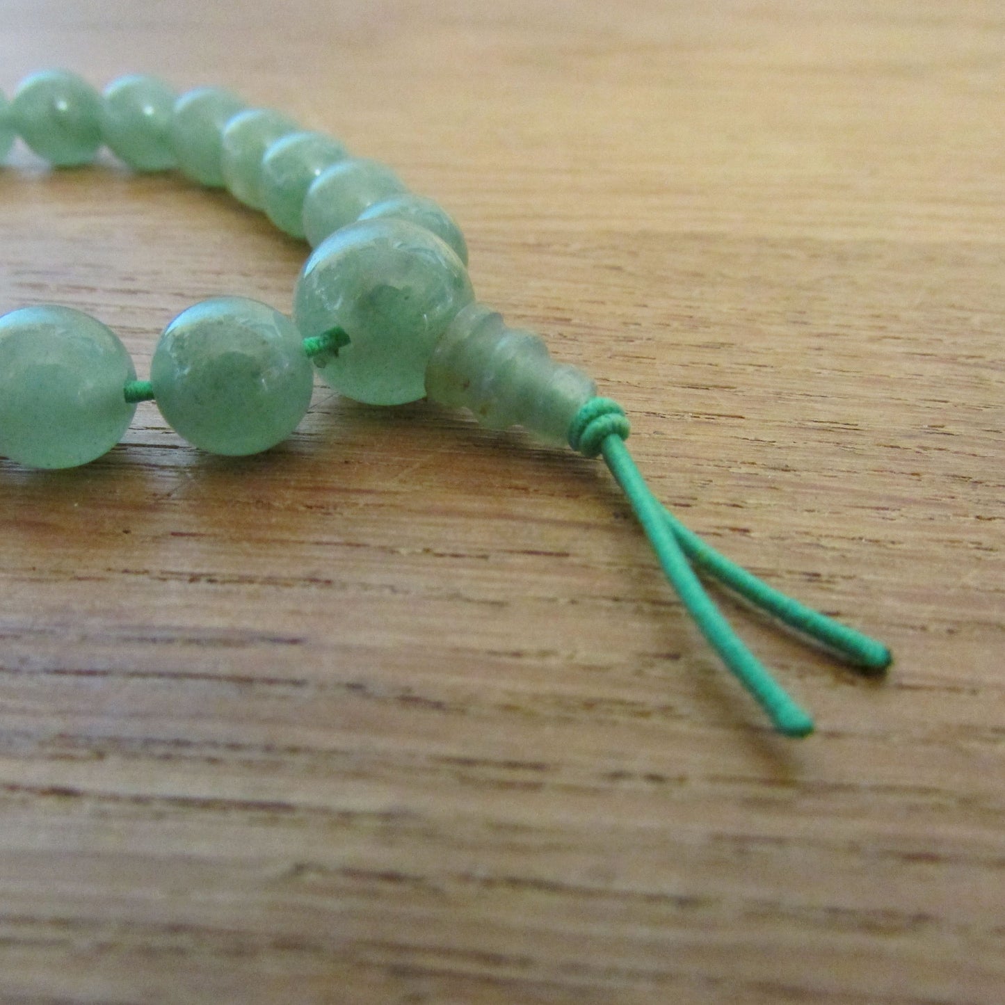 Vintage-style translucent green glass bead bracelet