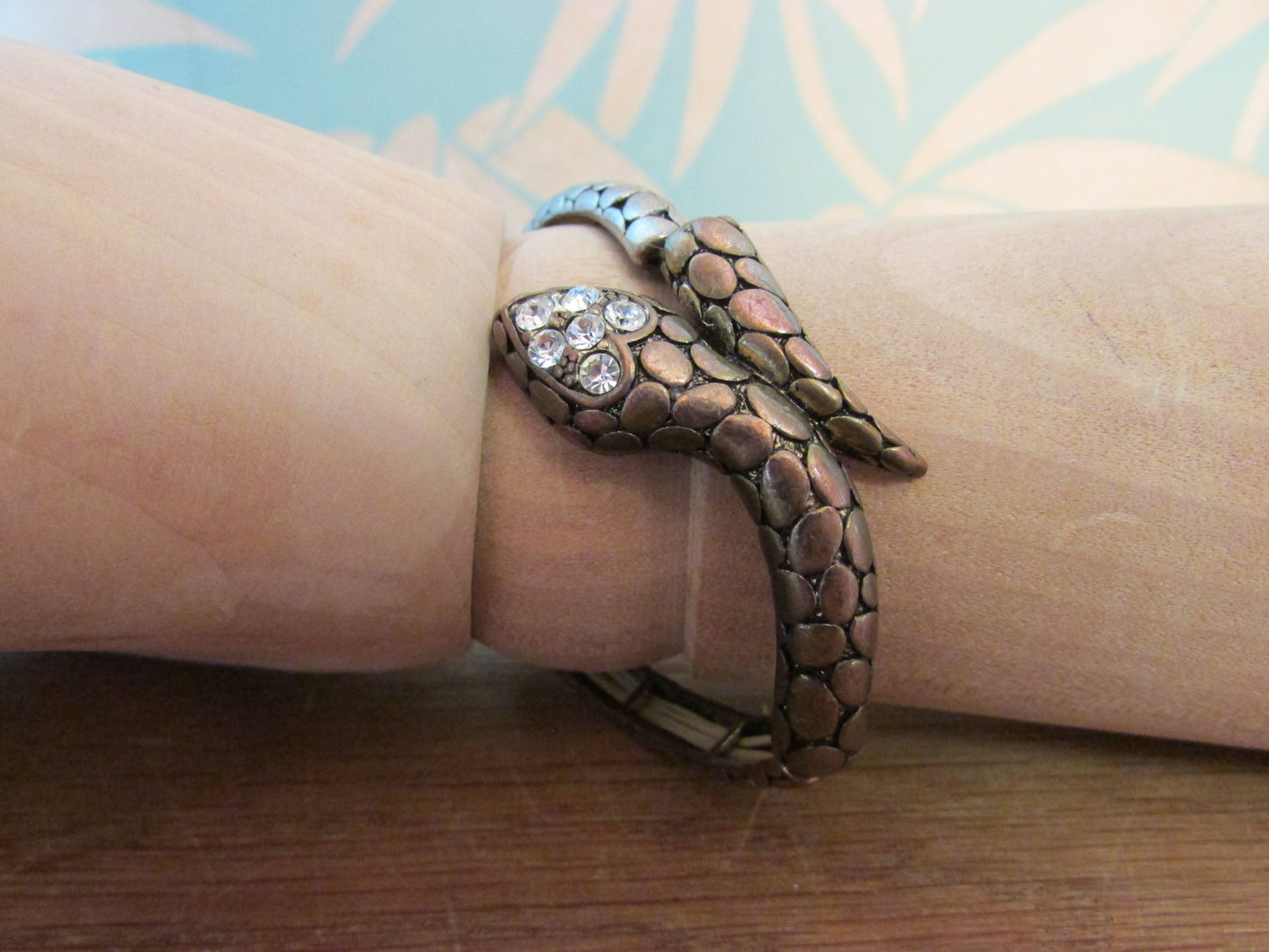 Vintage metal-tone stretch snake bangle with diamanté detail to head