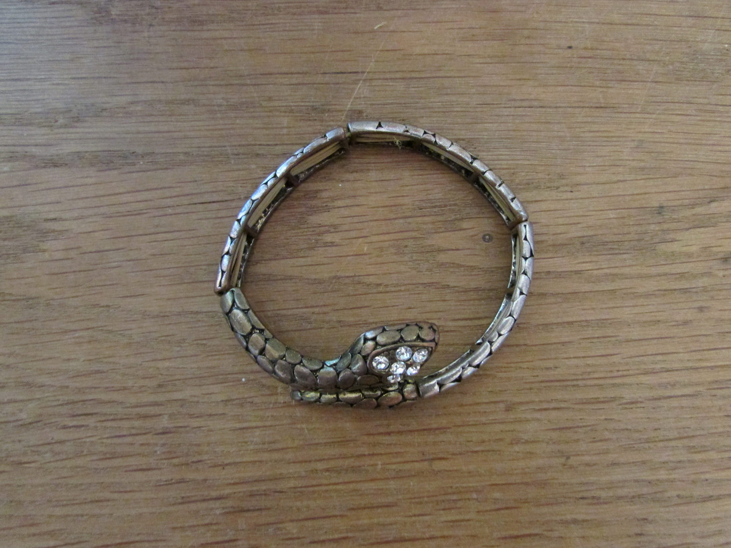 Vintage metal-tone stretch snake bangle with diamanté detail to head