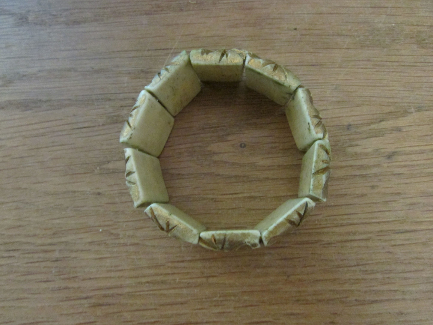 Vintage square medallion-stone bone link elasticated bracelet with gold relief surface