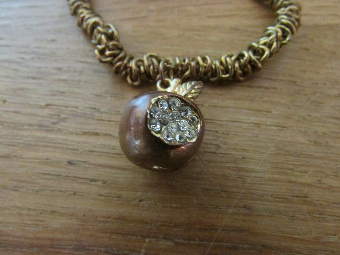 Vintage gold-tone elasticated chain bracelet with gold-tone & diamanté apple charm