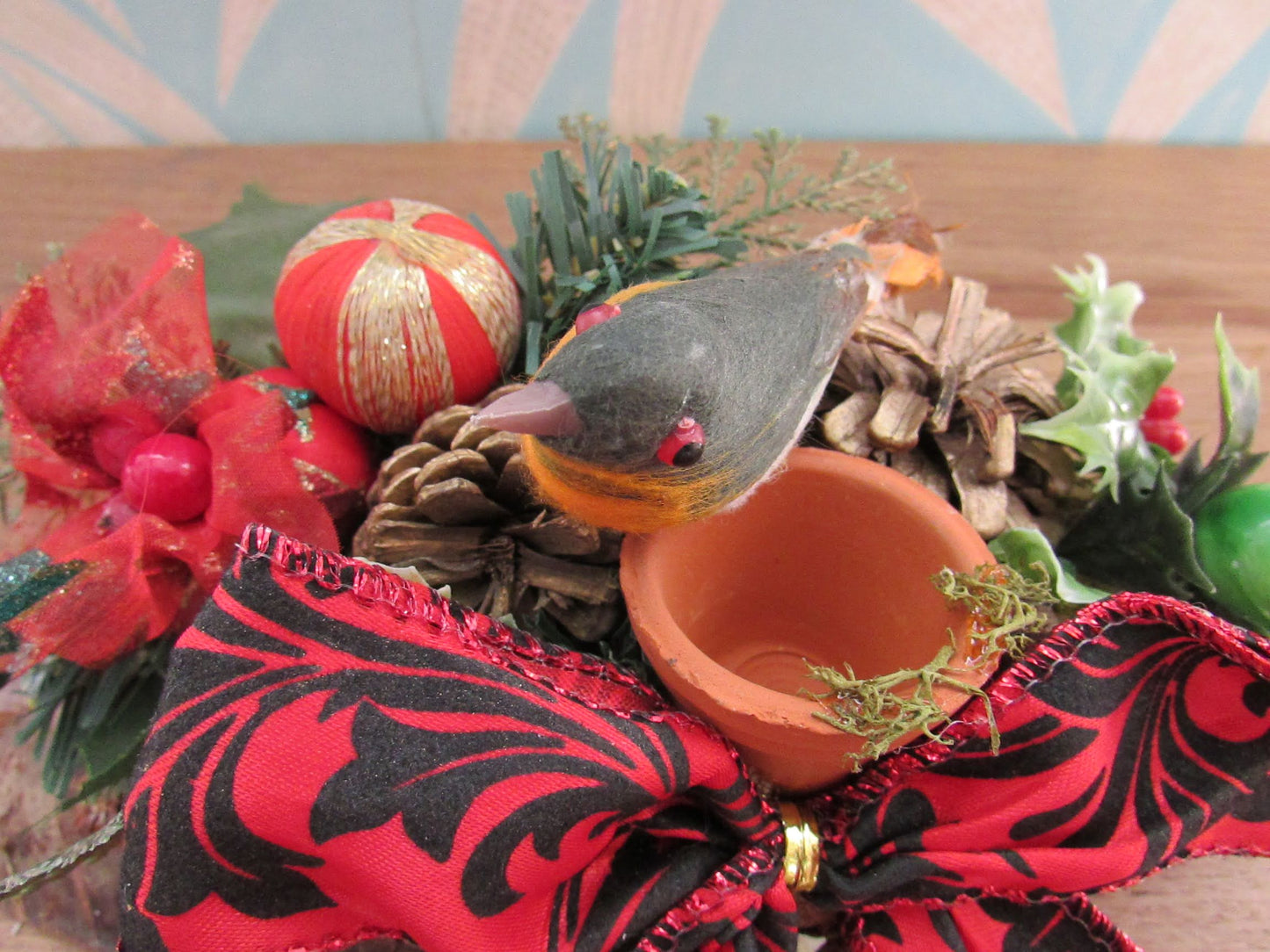 Vintage handmade Christmas candle centrepiece with robin and bow