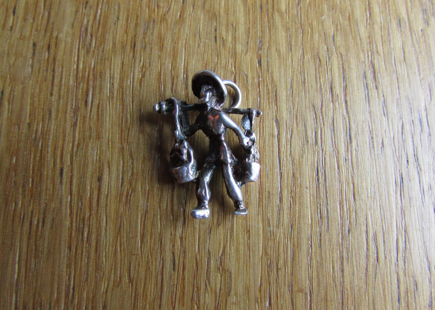 Vintage stering silver/silver-tone water carrier charm pendant
