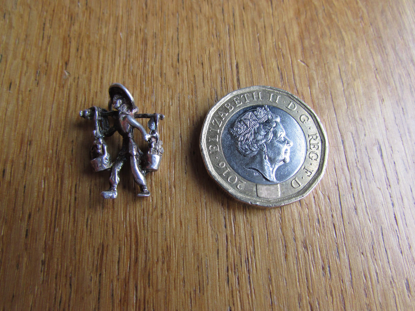 Vintage stering silver/silver-tone water carrier charm pendant