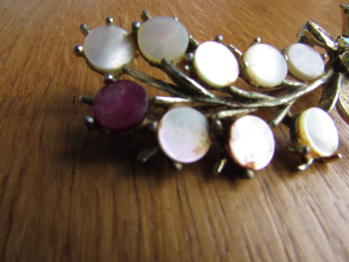 1950s leaf sprig brooch with pearlescent cabochon/flat disc detail