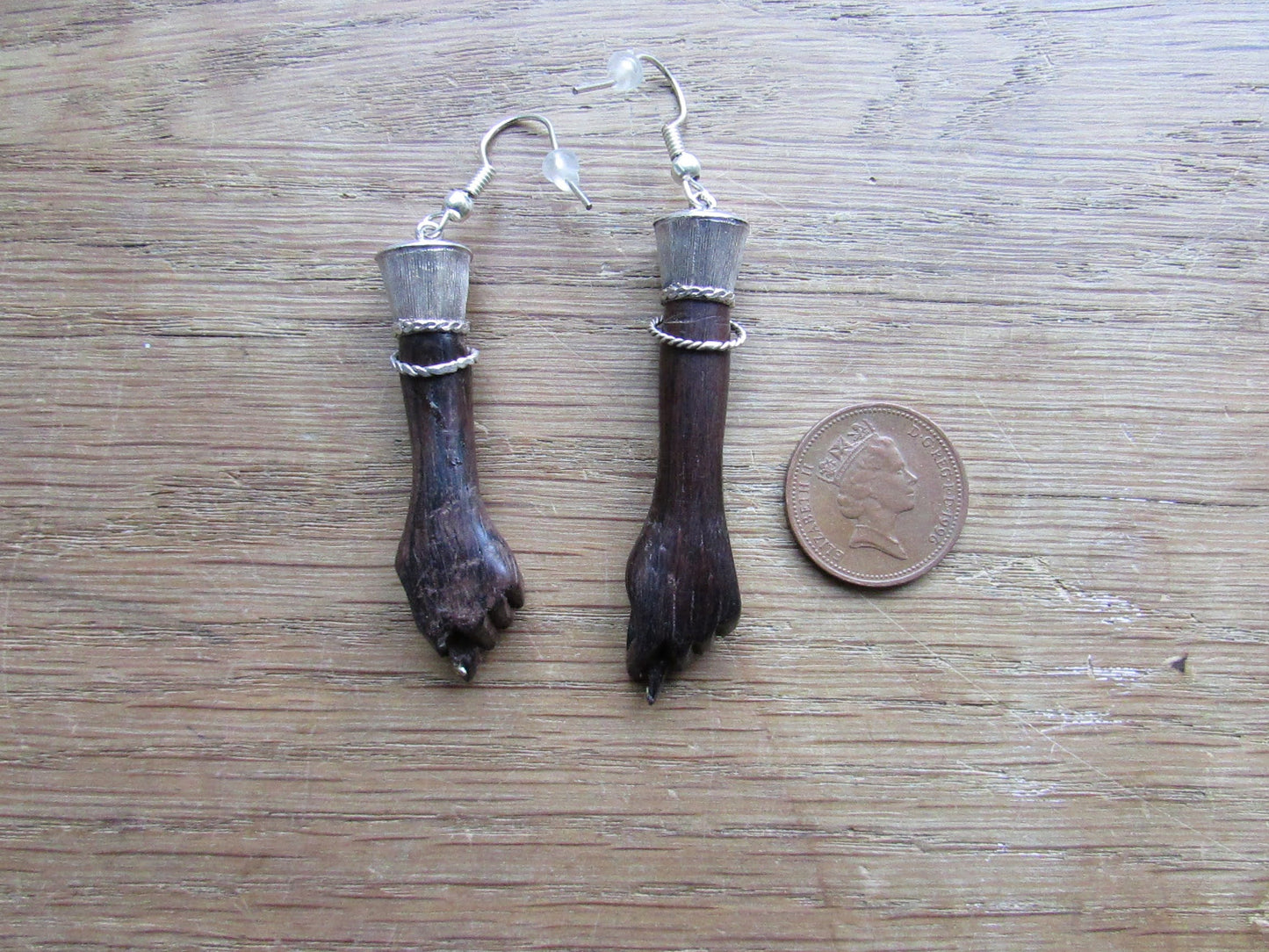 Home-made earrings made using vintage resin 'hands' & silver plated findings