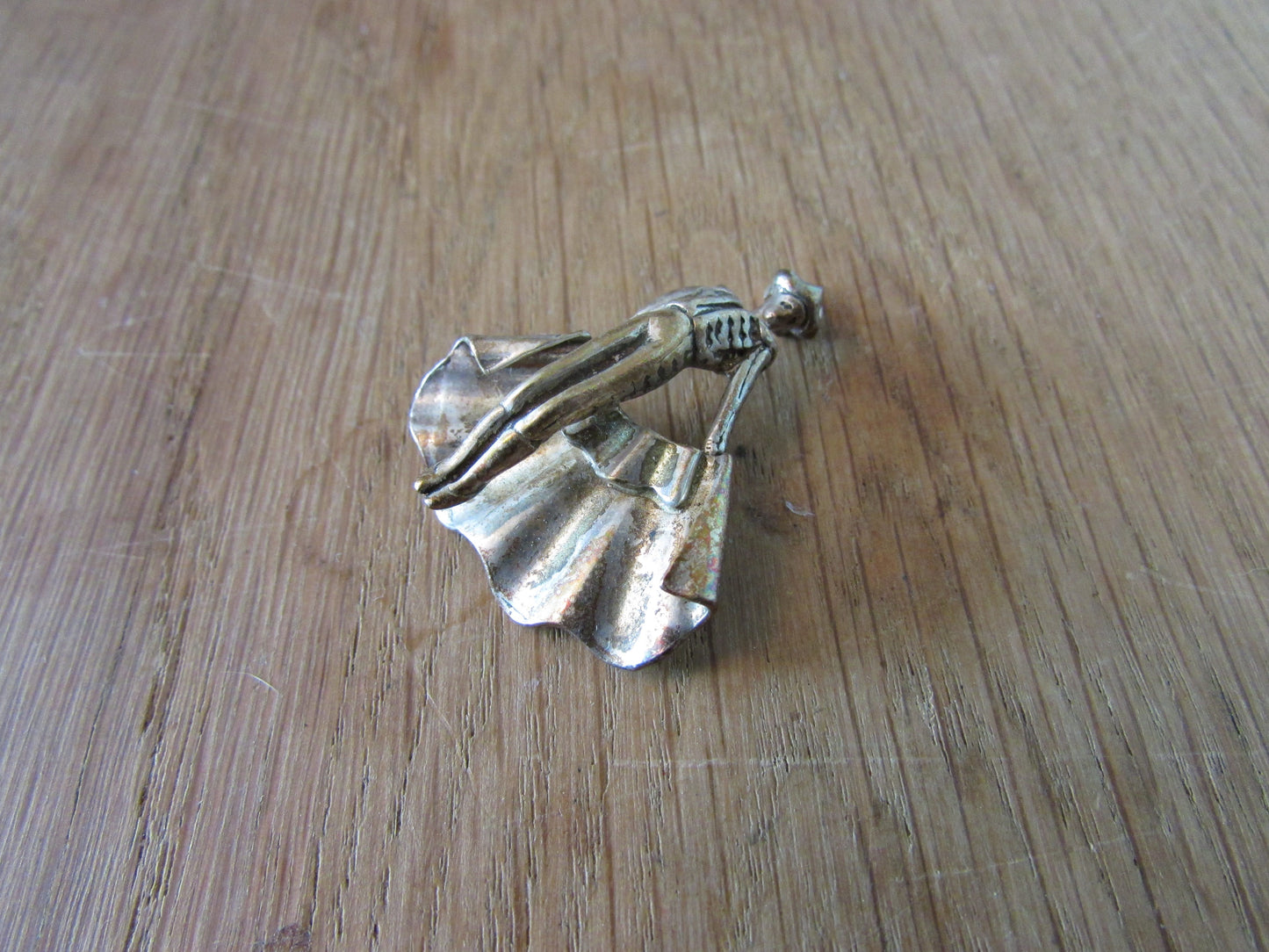 Vintage silver-tone matador charm