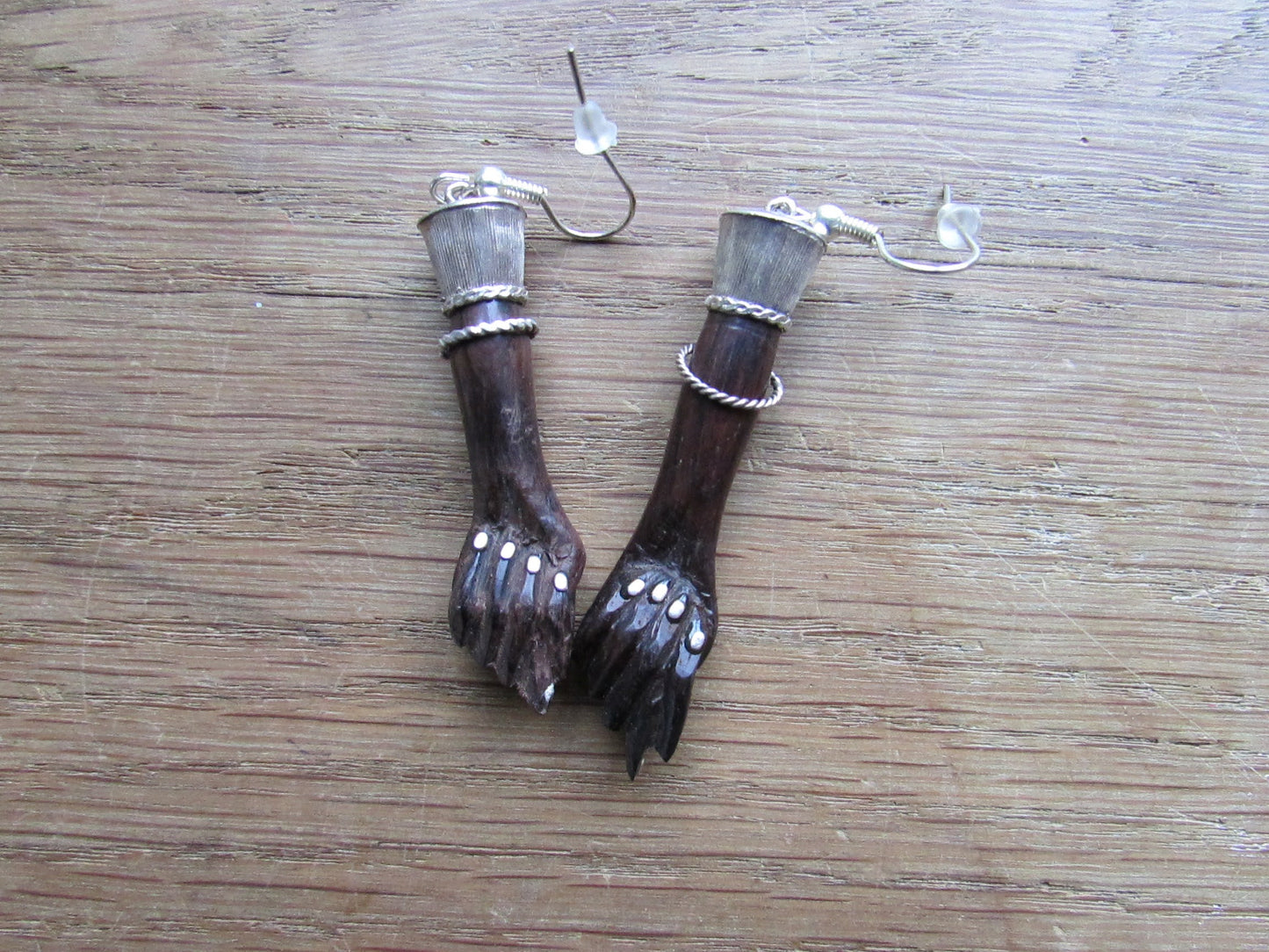 Home-made earrings made using vintage resin 'hands' & silver plated findings