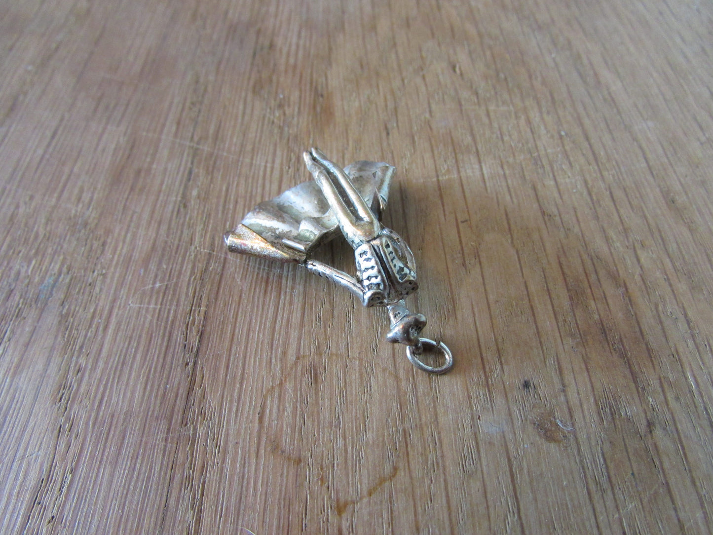 Vintage silver-tone matador charm