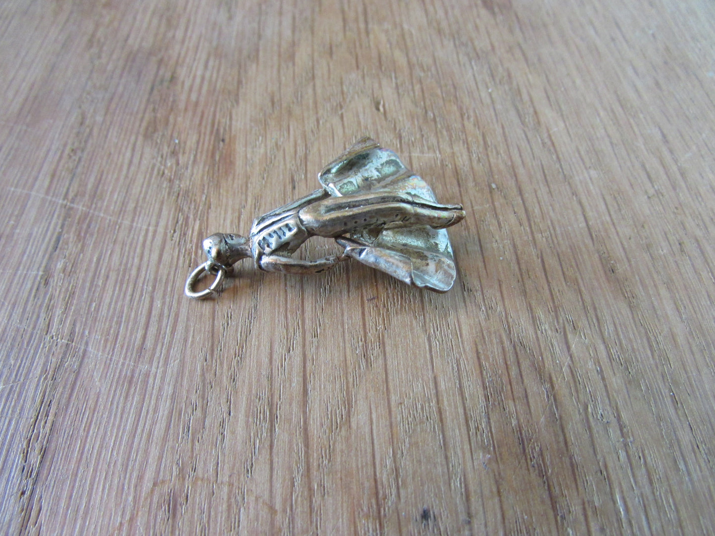 Vintage silver-tone matador charm