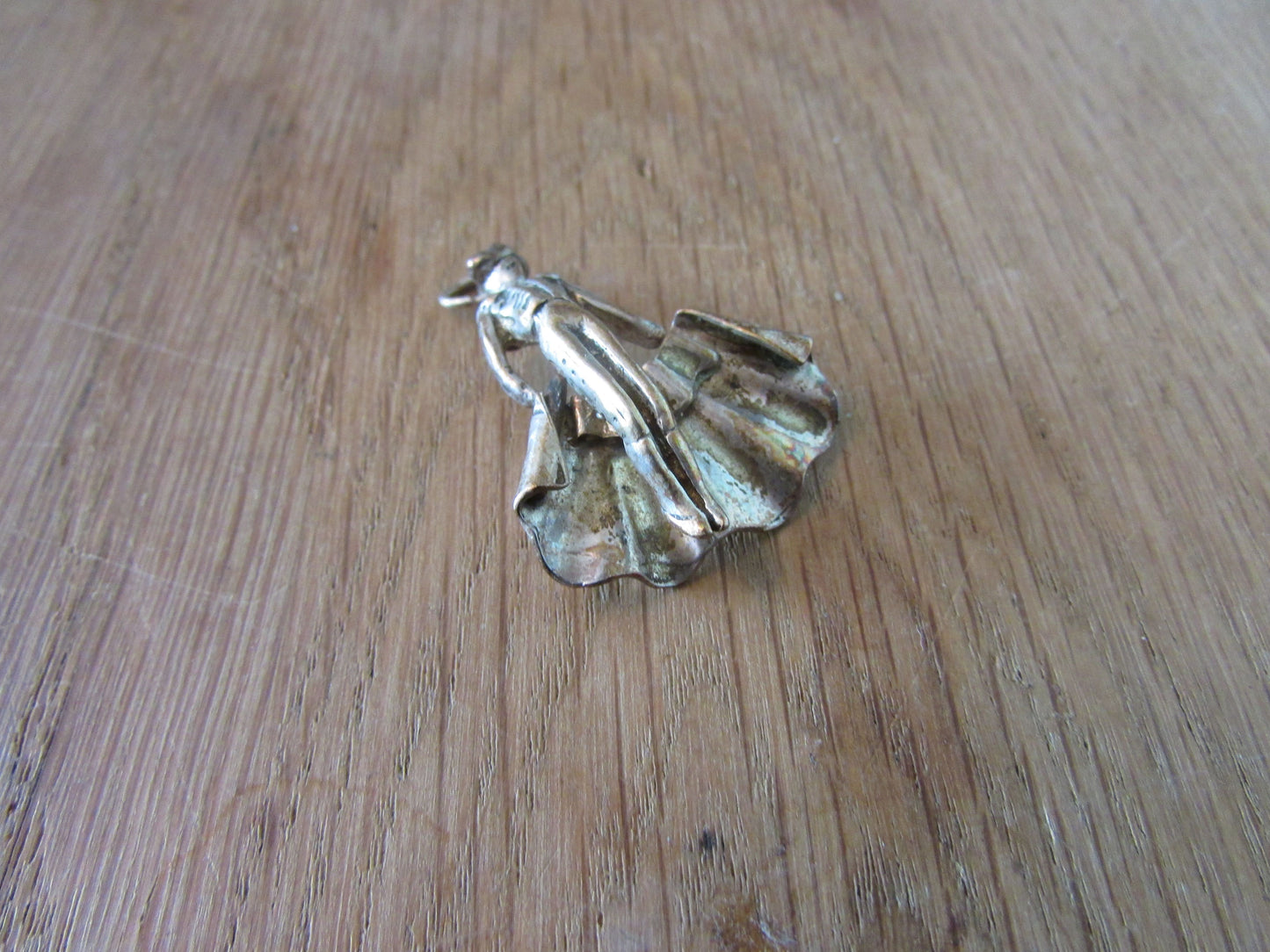 Vintage silver-tone matador charm