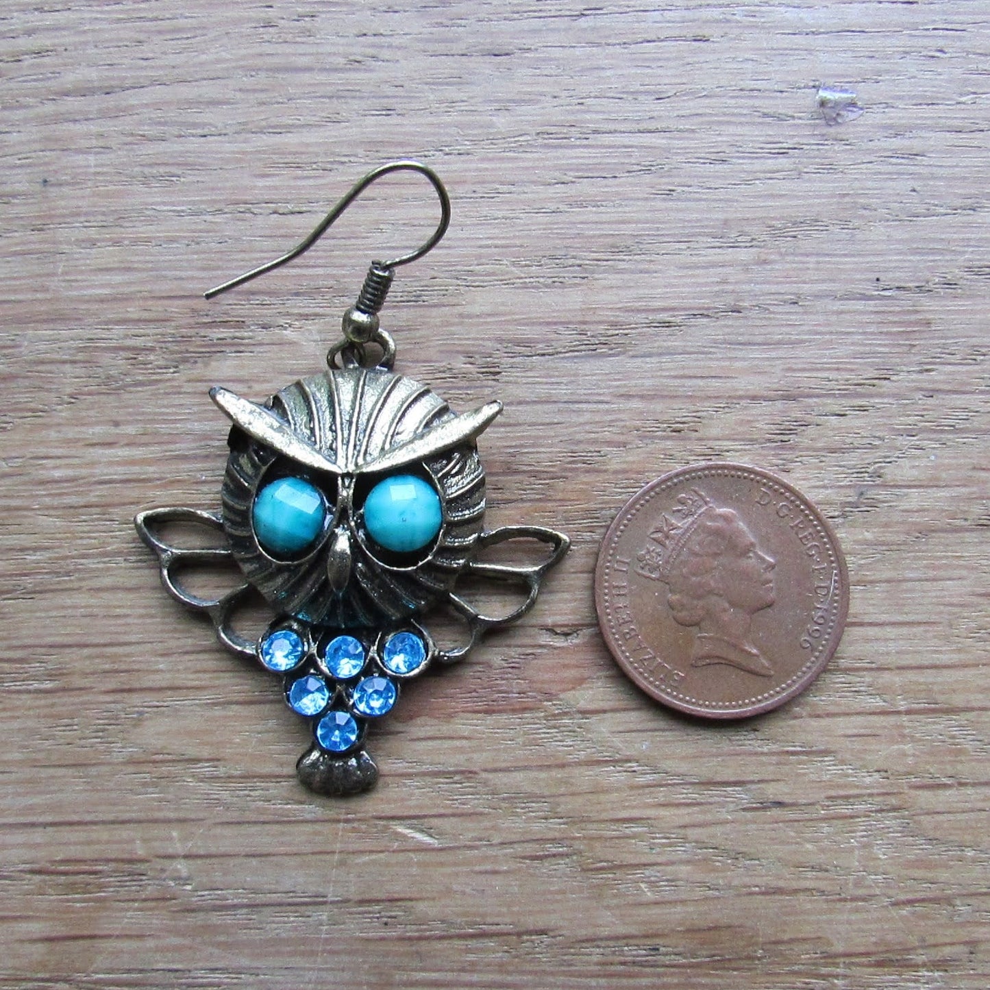 1980s gold-tone owl drop earrings with green cabochon eyes & turquoise rhinestone detail