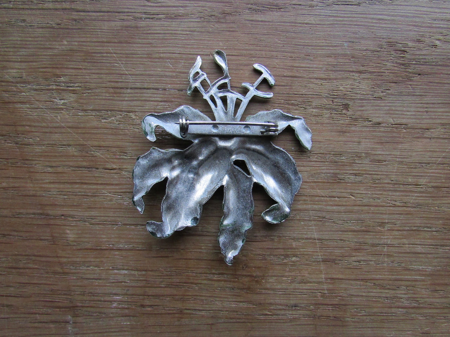 Large vintage Art Nouveau-style enamelled metal lily brooch