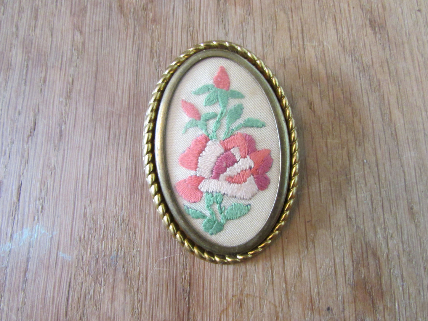 Vintage gold-tone barley twist oval frame embroidered roses brooch