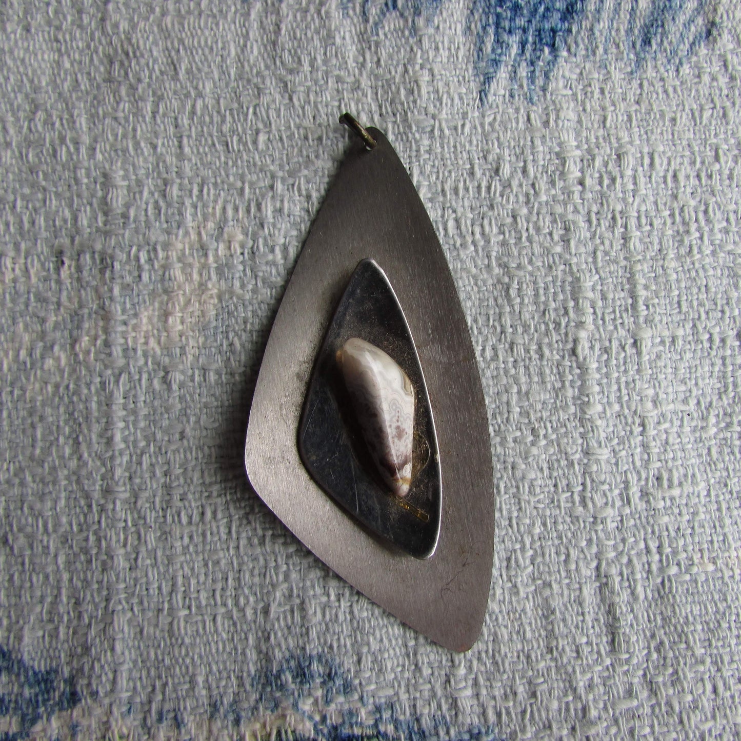 1970s modernist stainless steel pendant with small agate stone inlay