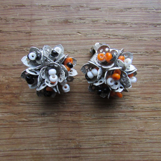 1960s articulated white/orange/black cluster seed bead clip-on earrings