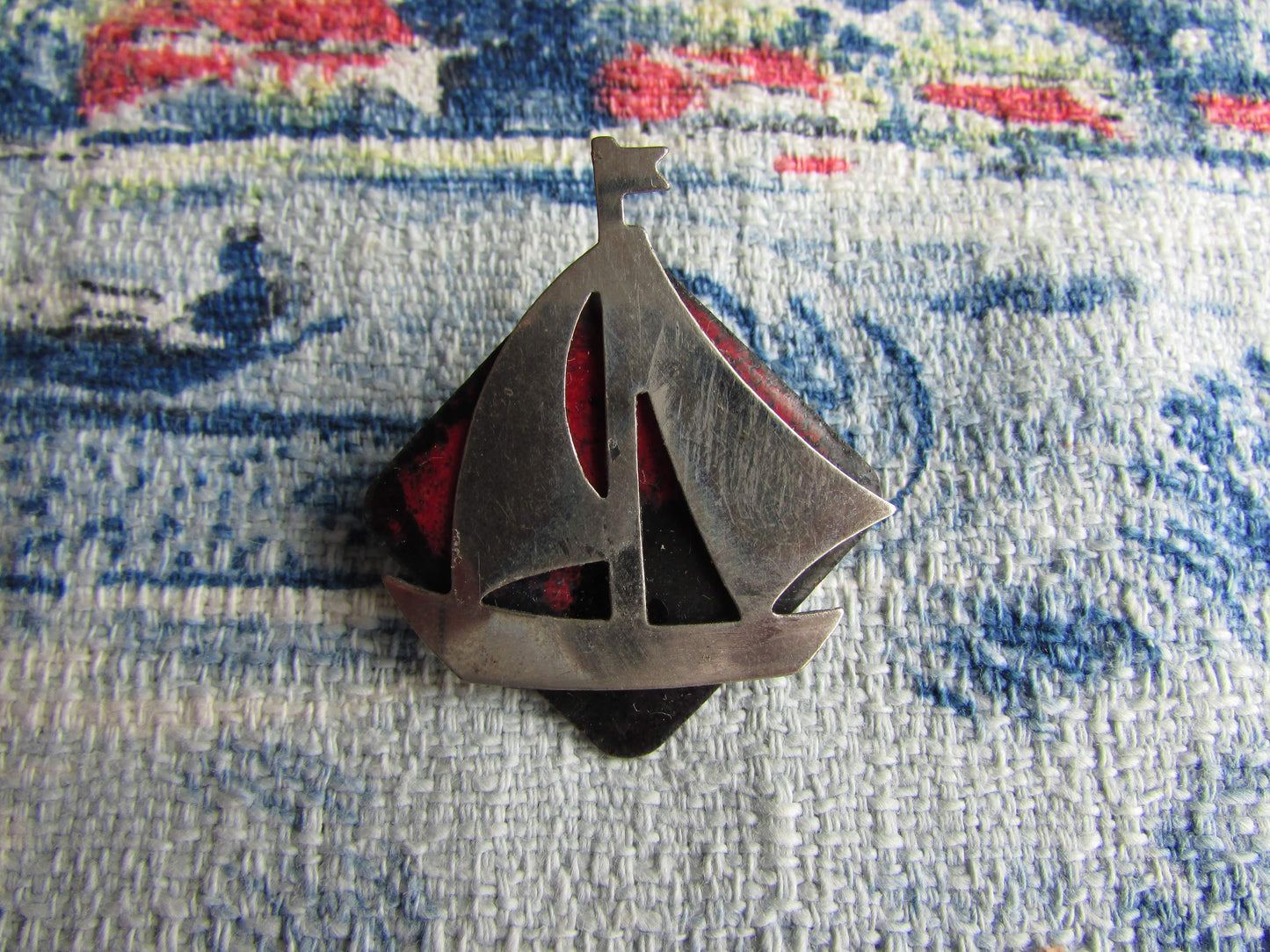Home-made brooch using vintage minature metal yacht and vintage enamel piece jewellery pieces