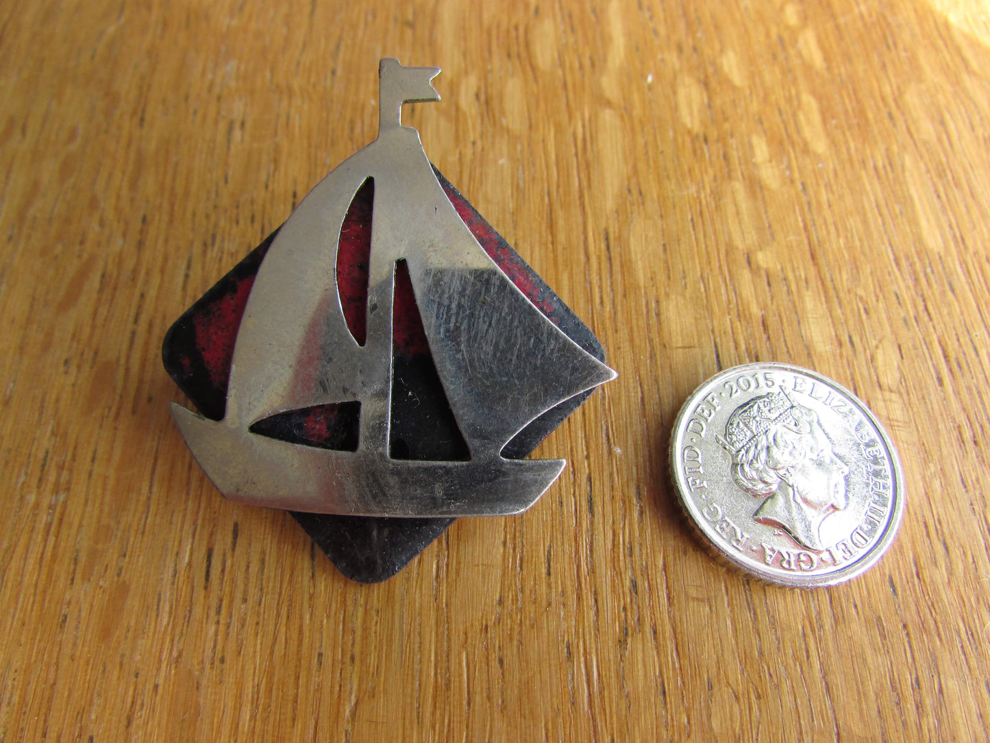 Home-made brooch using vintage minature metal yacht and vintage enamel piece jewellery pieces
