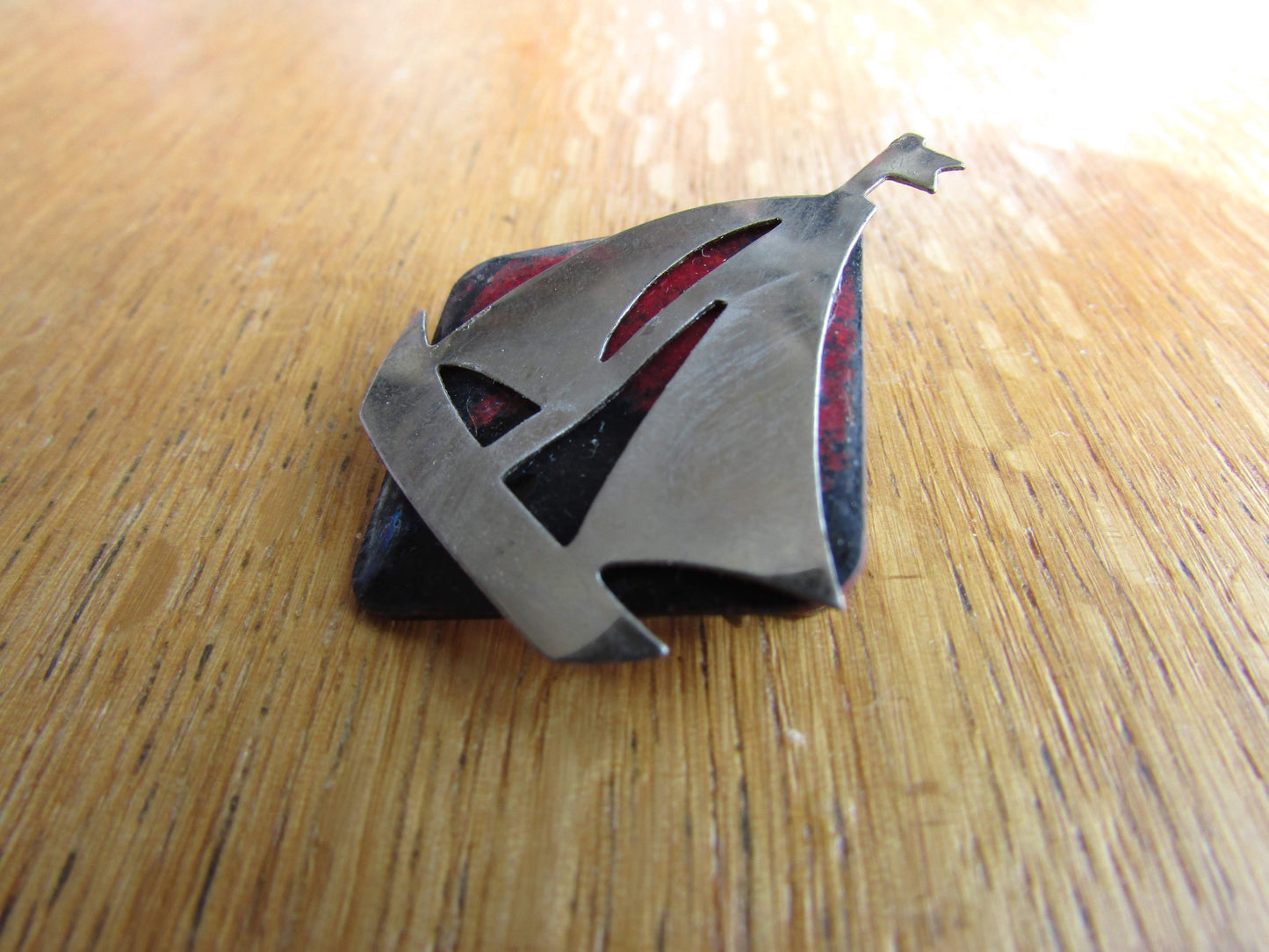 Home-made brooch using vintage minature metal yacht and vintage enamel piece jewellery pieces