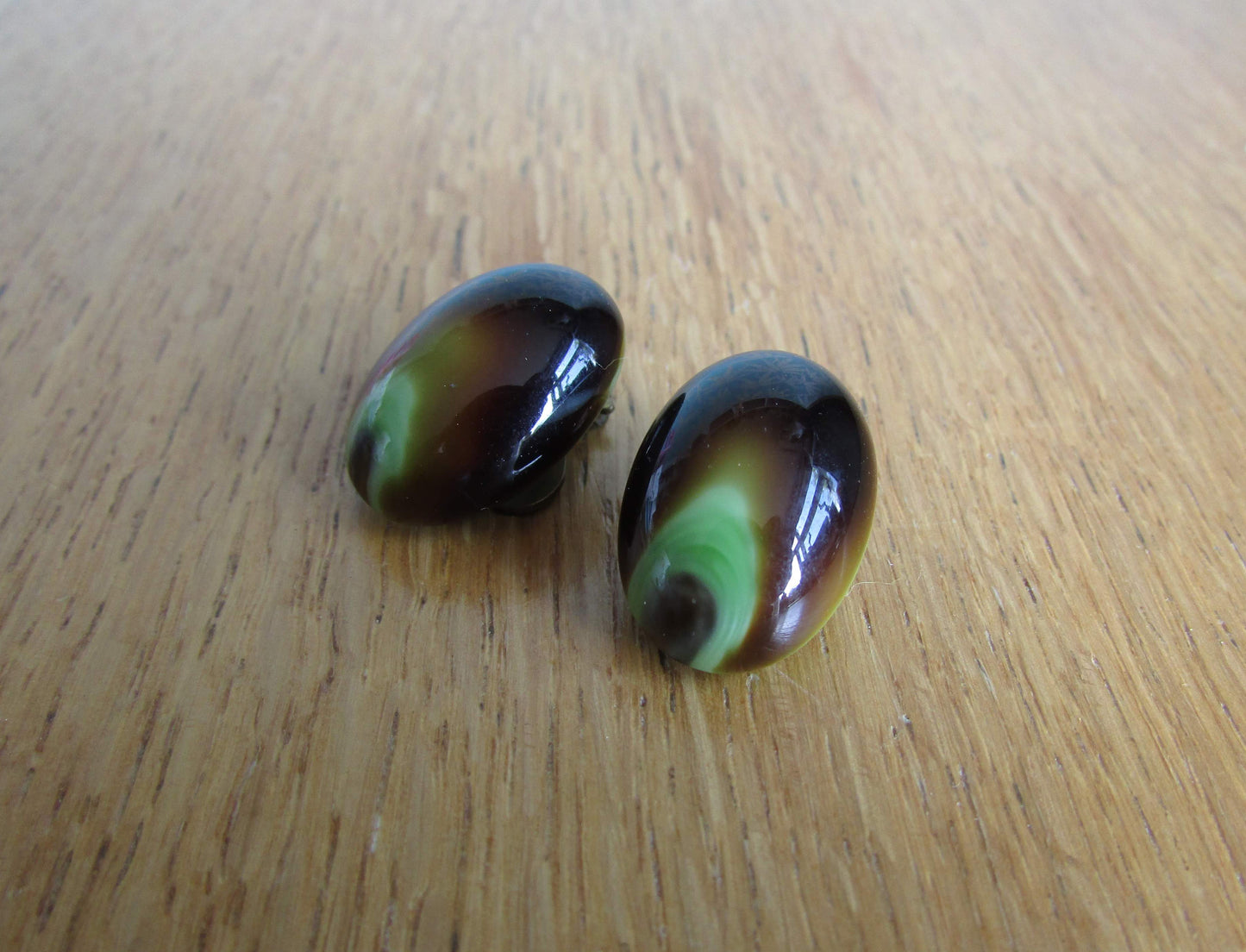 Vintage pastille-shaped peacock occelus-inspired glass clip-on earrings