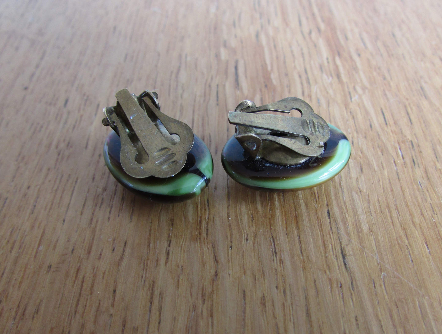 Vintage pastille-shaped peacock occelus-inspired glass clip-on earrings