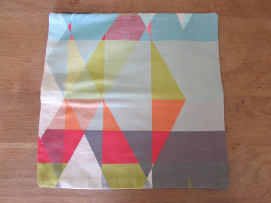 Home-made 1950s geometric pattern cushion cover with contrast black reverse
