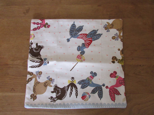 Home-made 1950s-style poodles cushion cover with contrast reverse