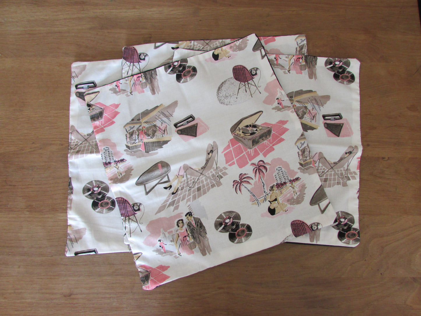 Home-made 1950s lifestyle-inspired pink & taupe tone cushion cover with contrast black reverse