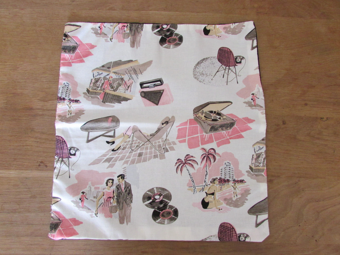 Home-made 1950s lifestyle-inspired pink & taupe tone cushion cover with contrast black reverse