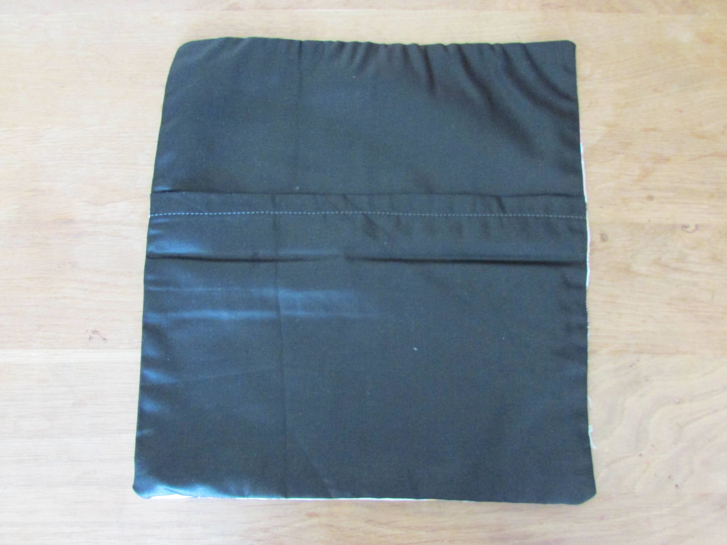 Home-made 1950s lifestyle-inspired pink & taupe tone cushion cover with contrast black reverse