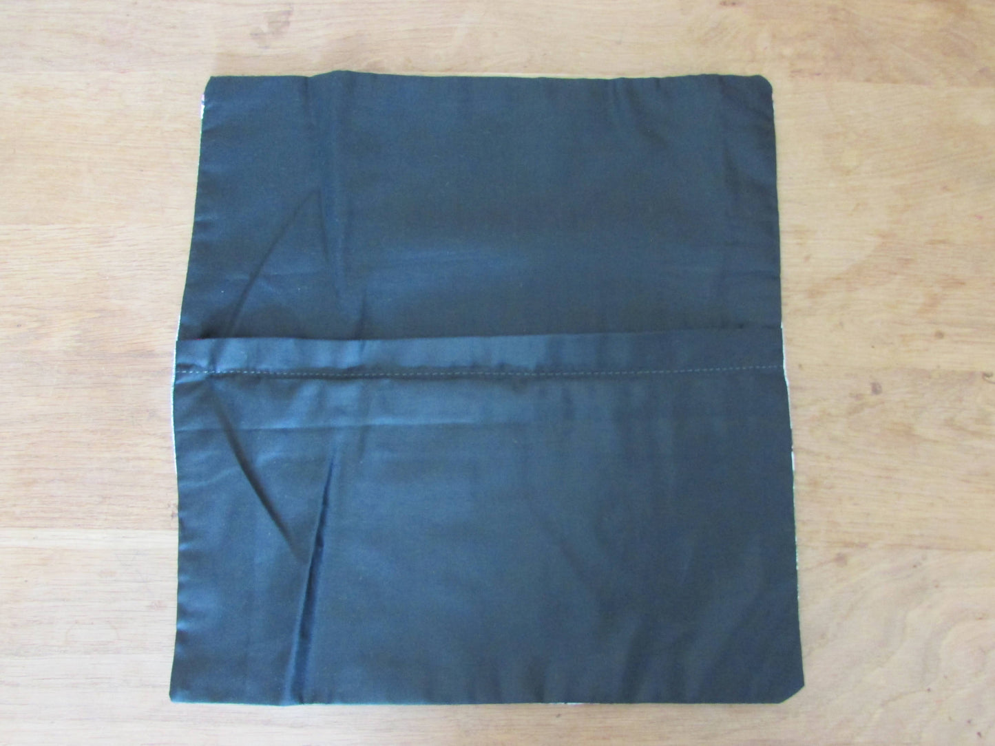 Home-made 1950s pink & green atomic barkcloth cushion cover with contrast black reverse